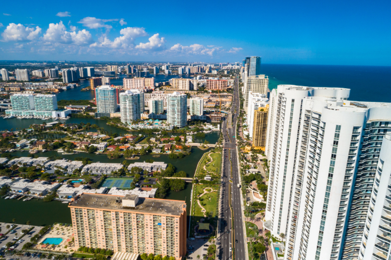 Sunny Isles Beach Aerial With Coastline Skyscrapers, Bay And Islands